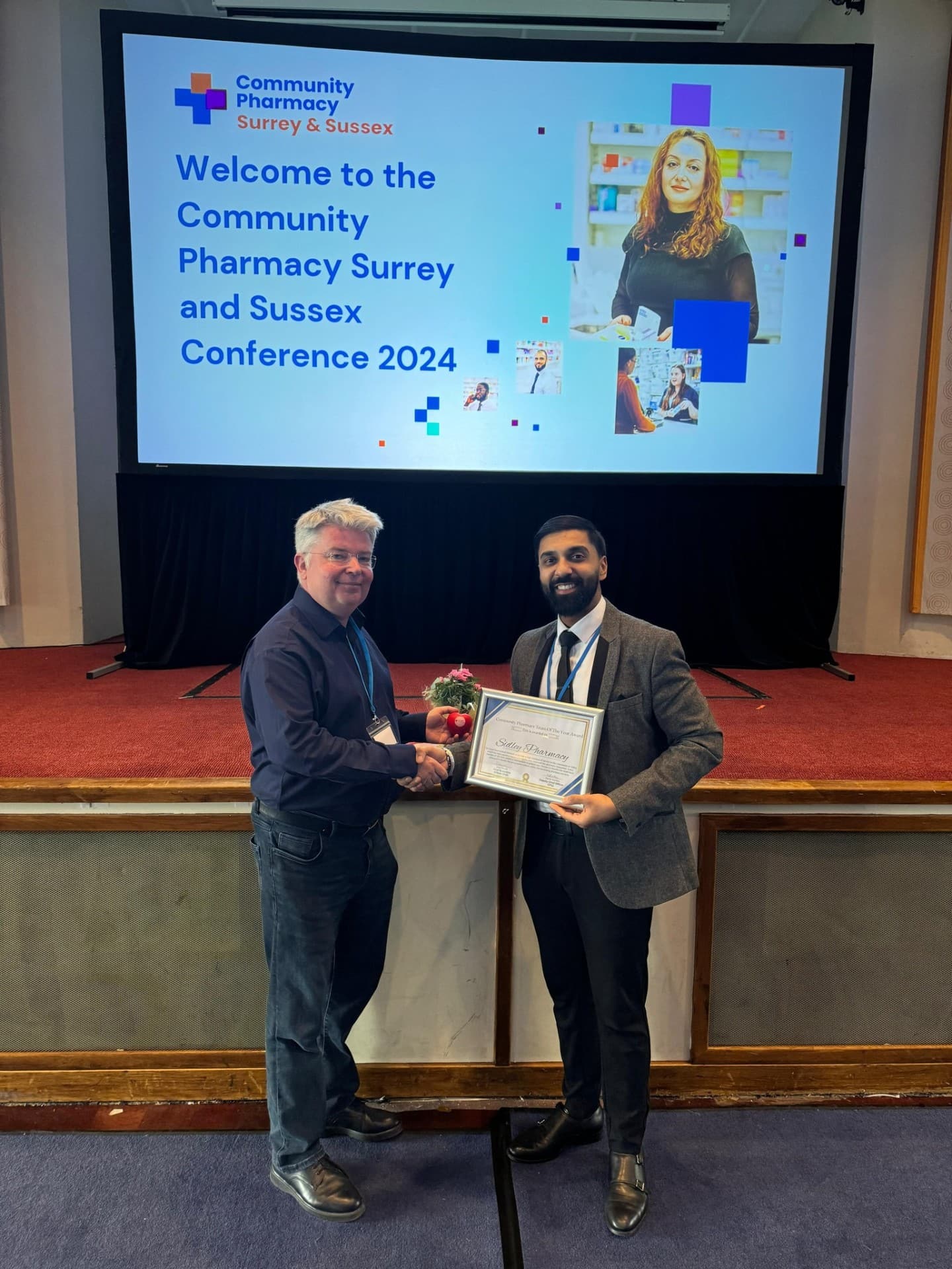 Sukhy Uppal receiving Community Pharmacy Team of the Year award